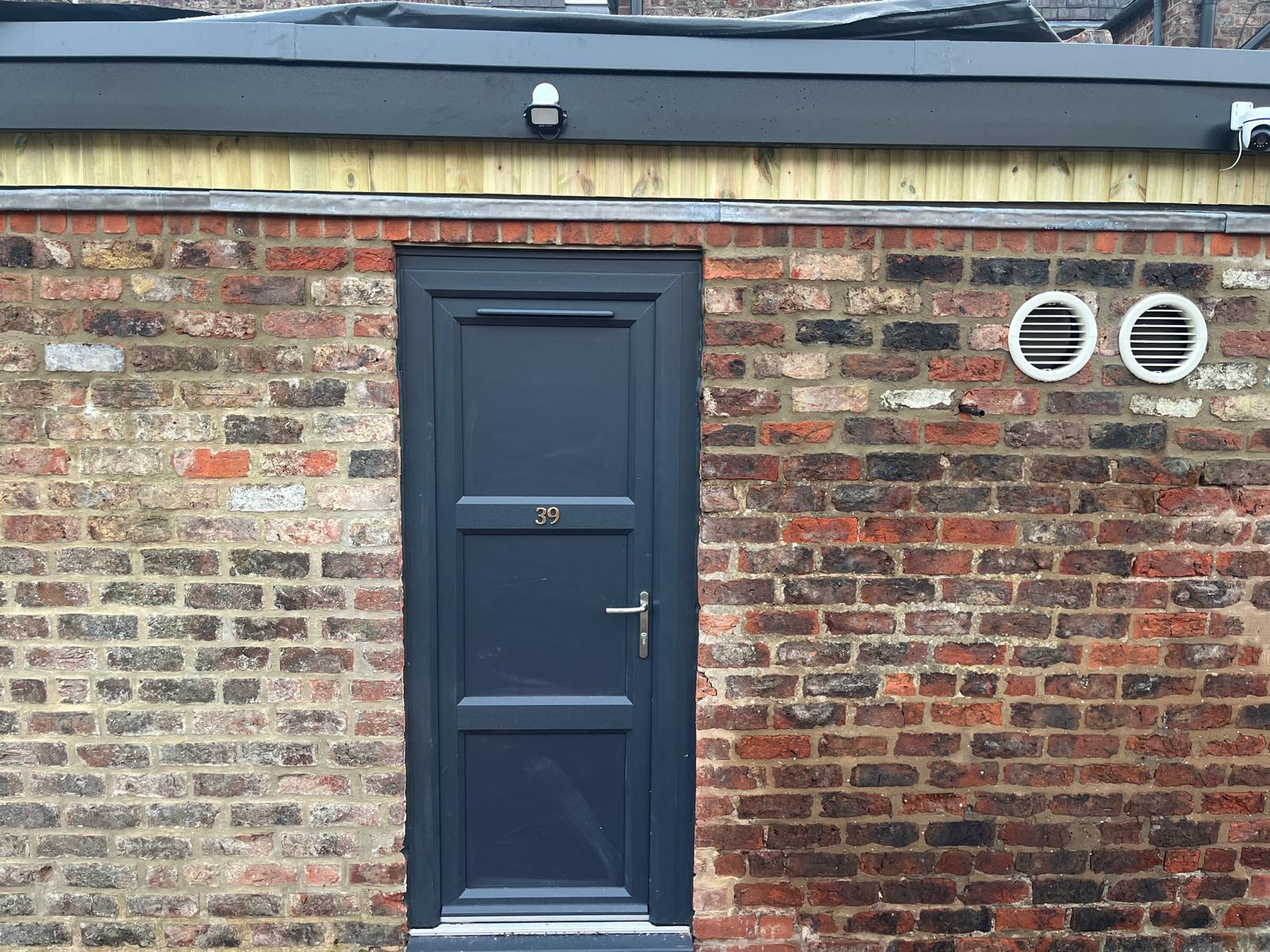 Podfit studio exterior — the grey door at 39 St Benedicts Road